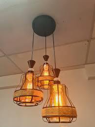 Enhance your home with our 3 Head Vintage Vulcan Cage Pendant Light 1769-3